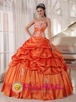 Bernried Germany Rust Red Quinceanera Dress With Appliques Decorate Bodice and Pick-ups Sweetheart Taffeta Ball Gown