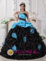 Cambita Garabitos Dominican Republic Beaded Decorate and Hand Made Flowers Customize Black and Aque Blue Ruffles Quinceanera Gowns