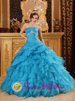 Burgos Spain Inexpensive Sky Blue Strapless Quinceanera Dress With Beading and Ruffles Decorate