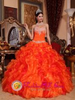 Huelva Spain Orange Quinceanera Dress With Sweetheart Neckline Beaded and Embroidery Decorate Multi-color Ruffles(SKU QDZY061y-1BIZ)